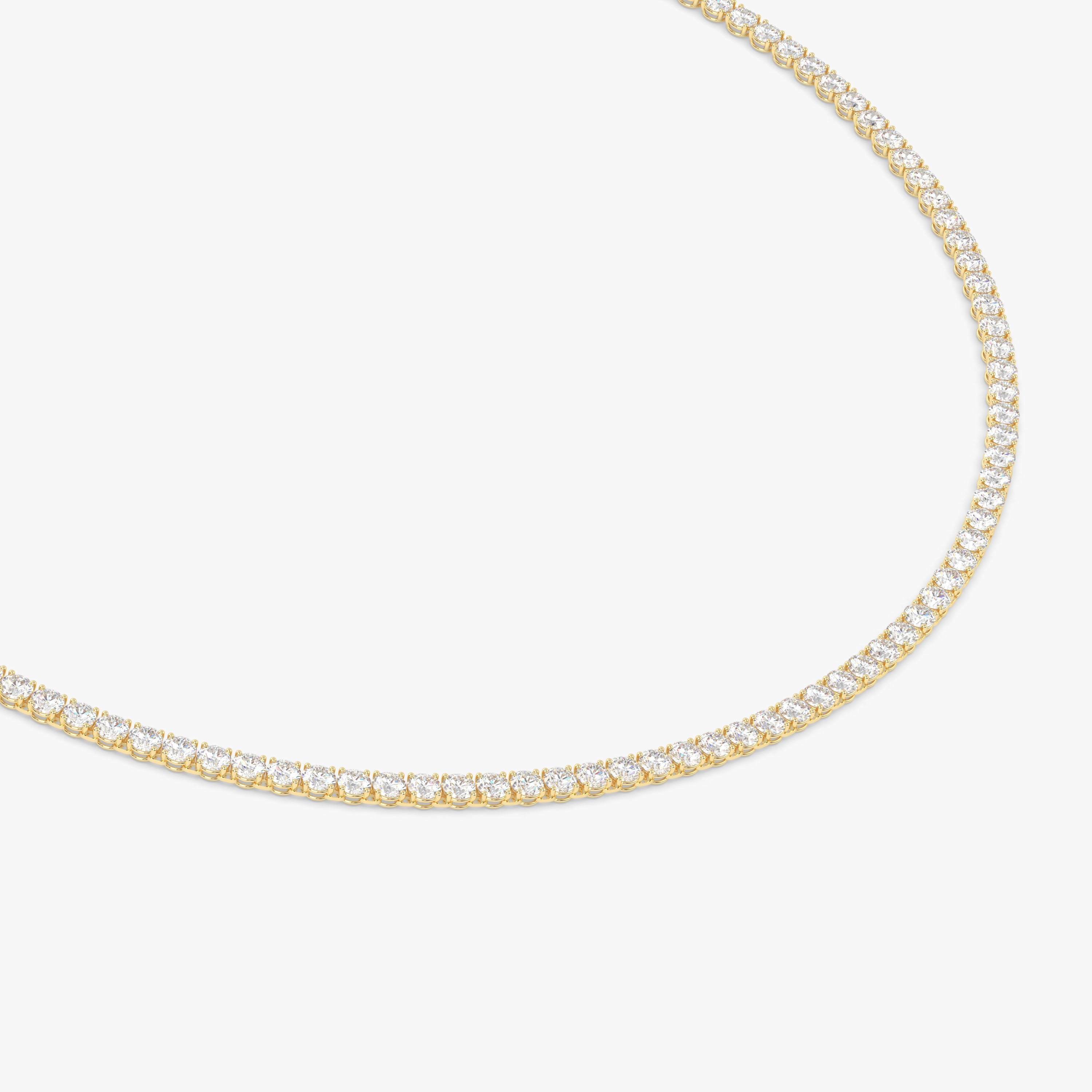 El collar se muestra con 14.40cts